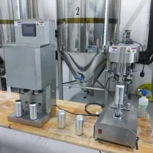 Llenadora y cerradora de latas (cerveza,vino,refrescos,etc..)